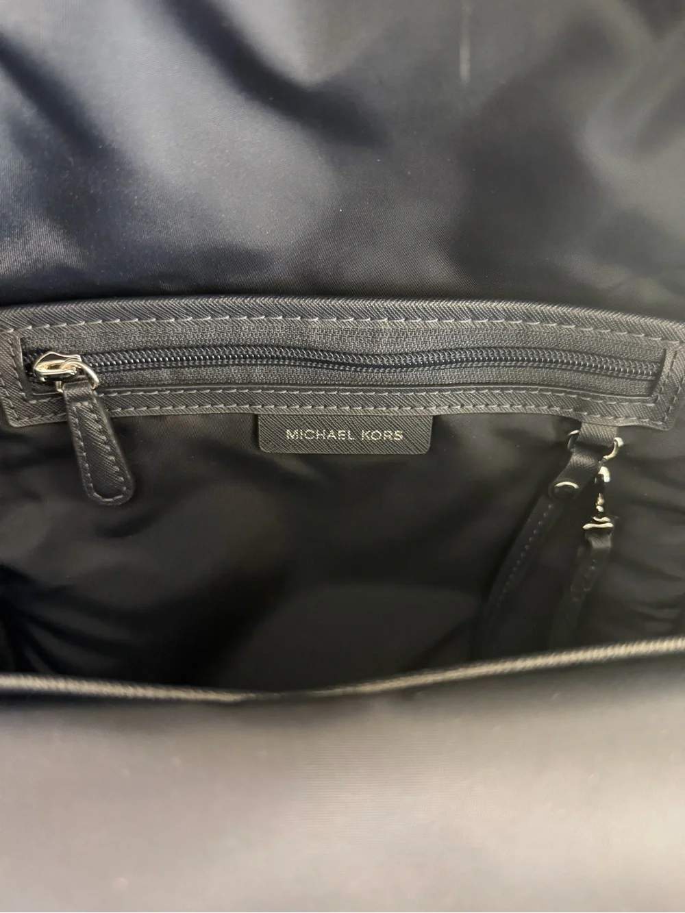 Michael Kors Navy Floral Mini Backpack with Teal and Light Blue Accents